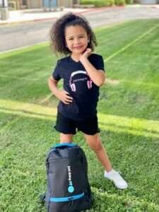 just doing life with serenity - pink headphones and gym bag